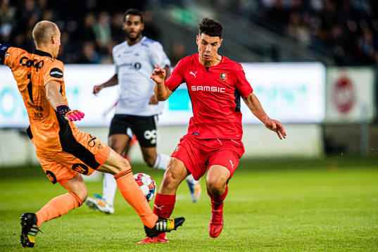 Andre Hansen of Rosenborg and Matthis Abline of Rennes