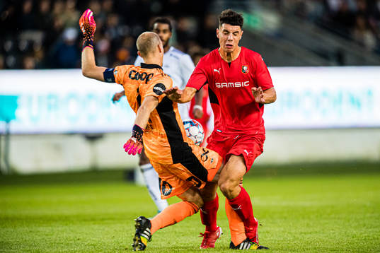 Andre Hansen of Rosenborg and Matthis Abline of Rennes