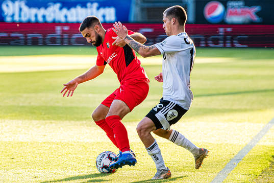 Romain Del Castillo of Rennes and Carl Johan Holse Justesen