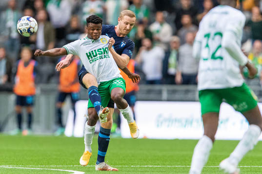 Hammarbys Akinkunmi Amoo och Malmö FFs Franz Brorsson