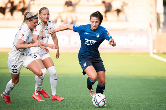 Isabella Hartig of Hoffenheim against Olivia Schough and