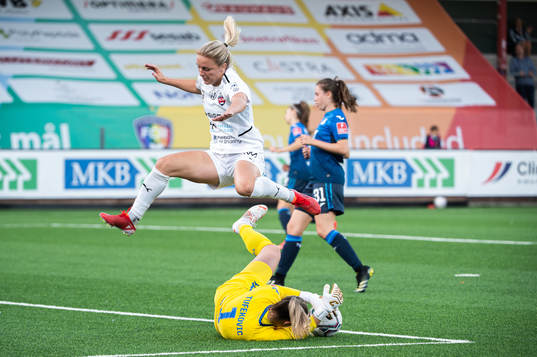 Mimmi Larsson of Rosengård against goalkeeper Martina