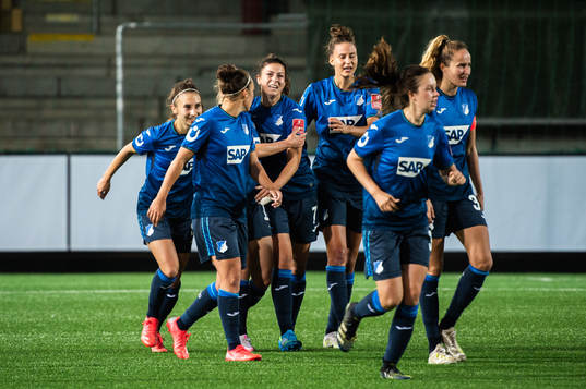 Chantal Hagel of Hoffenheim celebrate with teammates