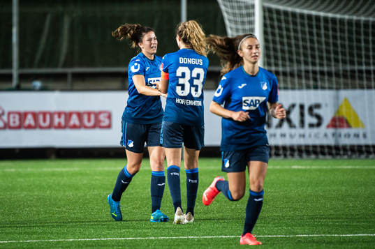 Chantal Hagel of Hoffenheim celebrate with teammates