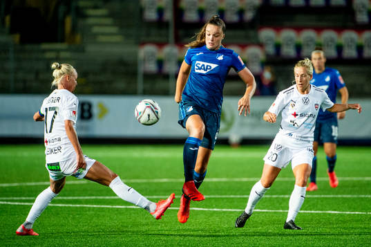 Tine Lea De Caigny of Hoffenheim and Caroline Seger and Mia