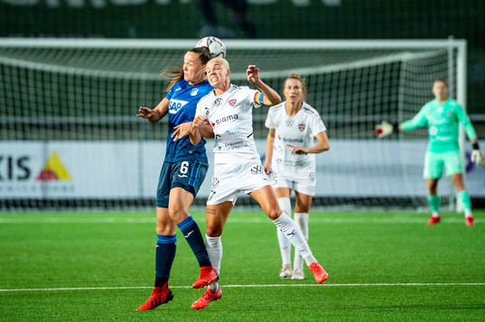 Tine Lea De Caigny of Hoffenheim and Caroline Seger of