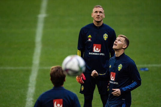 Goalkeeper Robin Olsen and Emil Krafth of the Swedish
