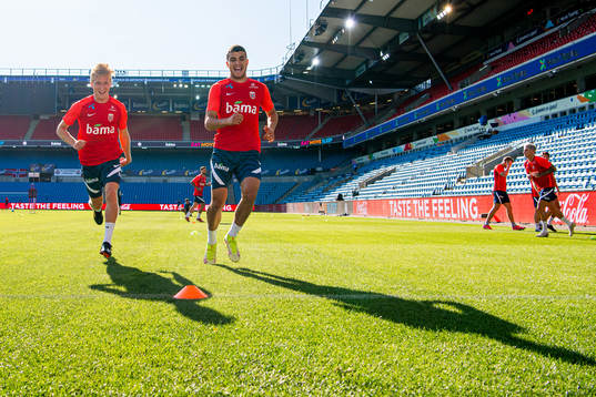 Birger Meling and Mohamed Elyounoussi of the Norwegian