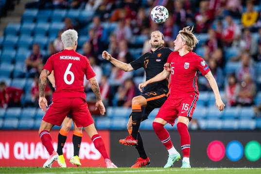 Daley Blind of Netherlands and Jens Petter Hauge of Norway
