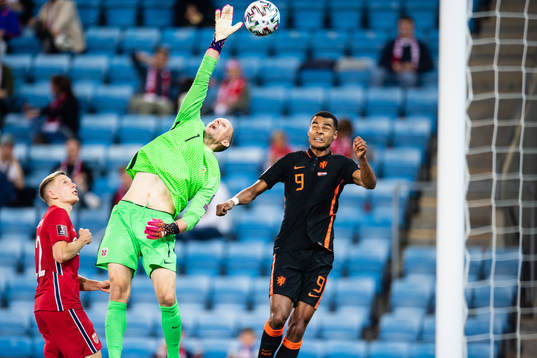 Marcus Holmgren Pedersen and goalkeeper André Hansen of