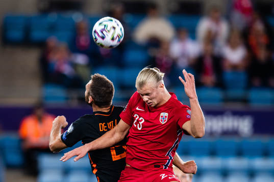 Stefan de Vrij of Netherlands and Erling Braut Haaland of