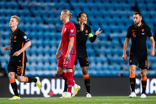 Erling Braut Haaland of Norway looks dejected and Virgil