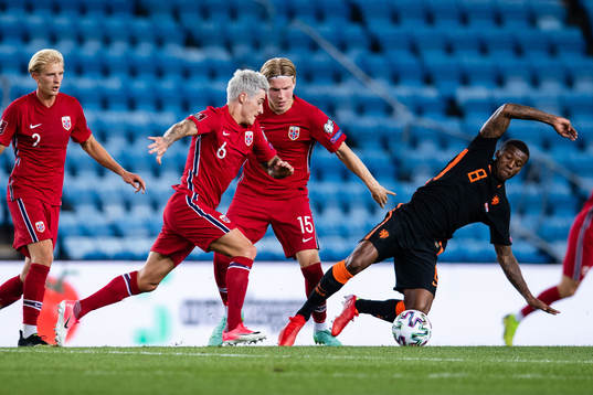 Mathias Normann of Norway and Georginio Wijnaldum of