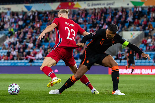 Erling Braut Haaland of Norway and Virgil van Dijk of