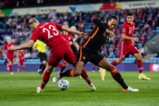 Erling Braut Haaland of Norway and Virgil van Dijk of