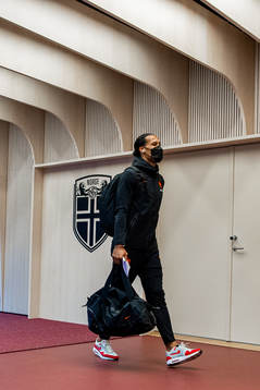 Virgil van Dijk of Netherlands arrives wearing a face mask