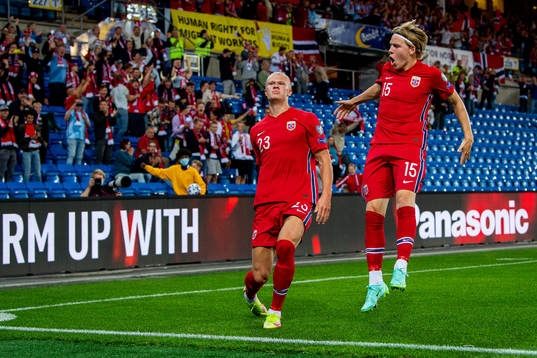 Erling Braut Haaland of Norway celebrates with teammate