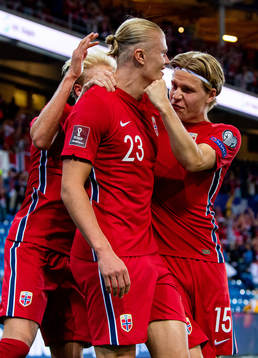 Erling Braut Haaland of Norway celebrates with teammate