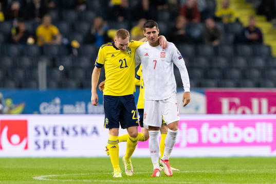 Dejan Kulusevski of Sweden and Alvaro Morata of Spain