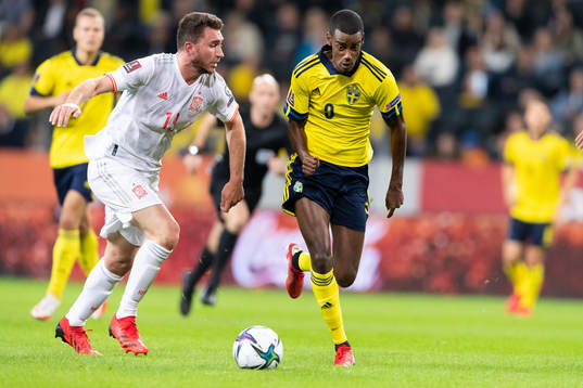 Aymeric Laporte and Alexander Isak of Sweden