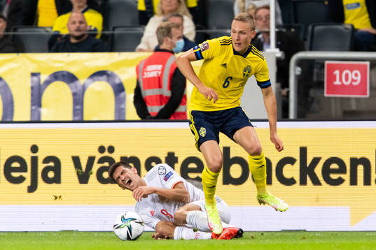 Gerard Moreno of Spain and Ludwig Augustinsson of Sweden