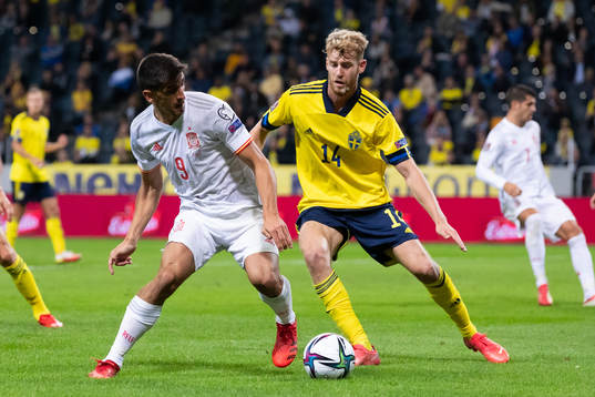 Gerard Moreno of Spain and Filip Helander of Sweden