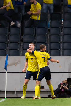 Dejan Kulusevski and Viktor Claesson celebrate