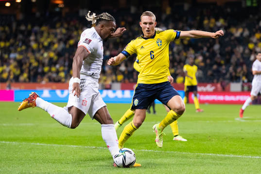Adama Traore of Spain and Ludwig Augustinsson of Sweden