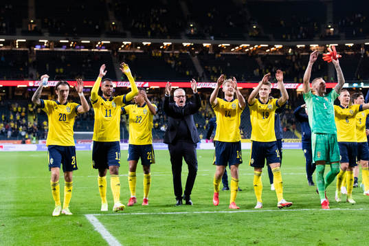 The Swedish team celebrate