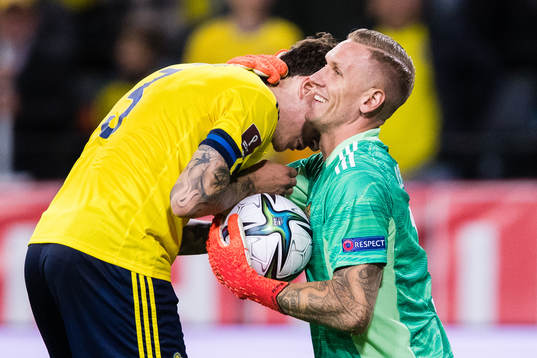 Victor Nilsson Lindelöf and goalkeeper Robin Olsen
