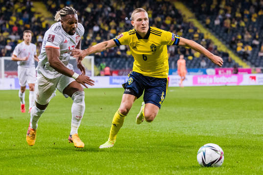 Adama Traore of Spain and Ludwig Augustinsson of Sweden