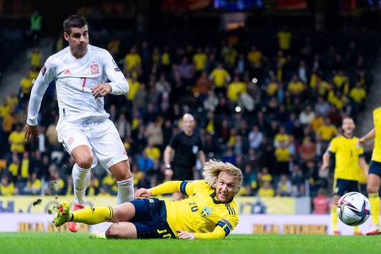 Alvaro Morata of Spain and Emil Forsberg of Sweden
