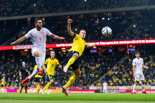 Koke of Spain and Viktor Claesson of Sweden