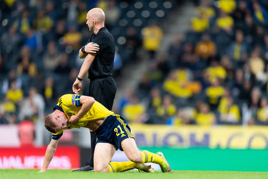 Dejan Kulusevski of Sweden in pain