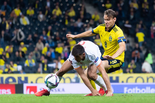 Gerard Moreno of Spain and Albin Ekdal of Sweden