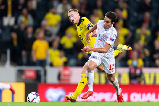 Dejan Kulusevski of Sweden and Eric Garcia of Spain