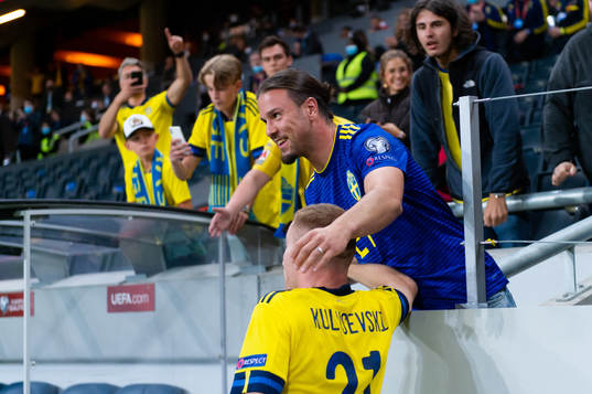 Dejan Kulusevski of Sweden celebrates with supporters