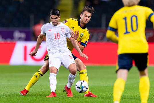 Carlos Soler of Spain and Albin Ekdal of Sweden