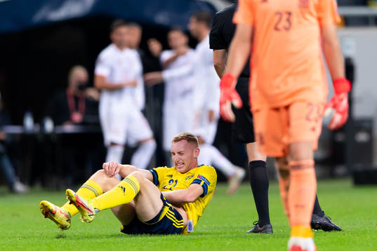 Dejan Kulusevski of Sweden in pain