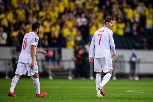 Koke and Alvaro Morata of Spain look dejected