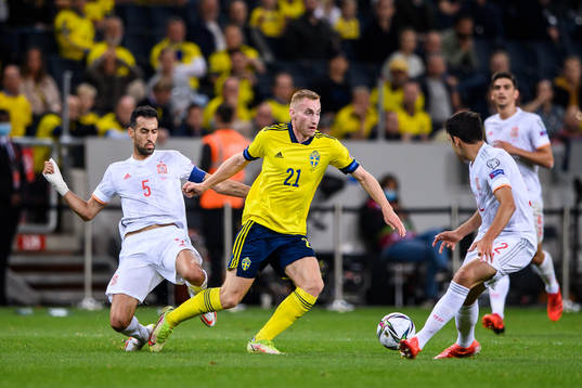 Sergio Busquets of Spain against Dejan Kulusevski of Sweden