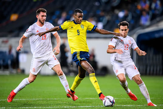Aymeric Laporte and Eric Garcia of Spain against Alexander