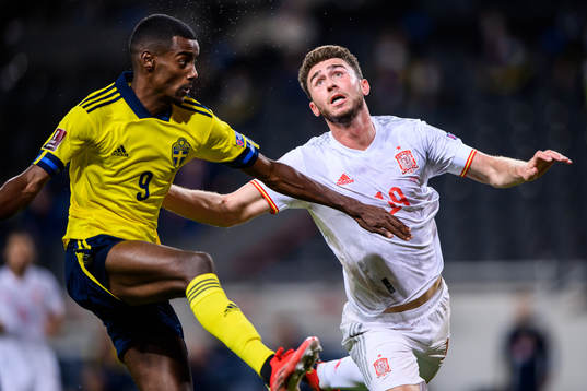 Alexander Isak of Sweden against Aymeric Laporte of Spain