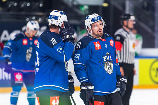 Niklas Hansson and Anton Lander of Zug look dejected
