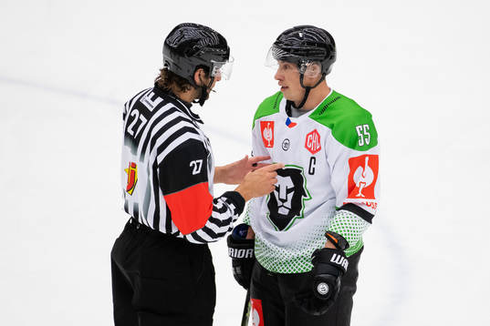 Referee MikaelSjökvist and Martin Sevc of Mlada Boleslav