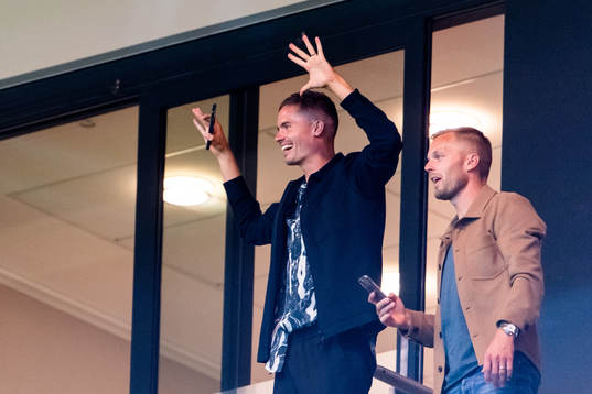 Mikael Lustig and Sebastian Larsson in the stands