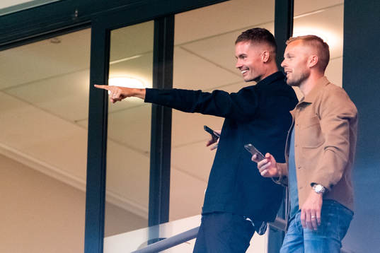 Mikael Lustig and Sebastian Larsson in the stands