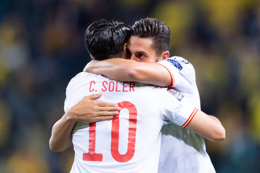 Carlos Soler and Koke of Spain celebrate