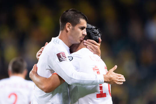 Alvaro Morata and Carlos Soler of Spain celebrate