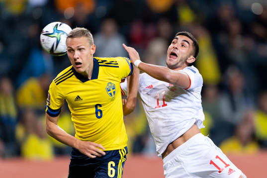 Ludwig Augustinsson of Sweden and Ferran Torres of Spain